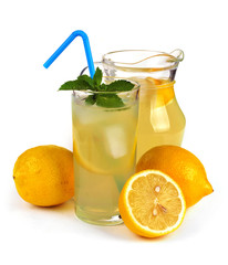 lemon juice in a jug and fruit