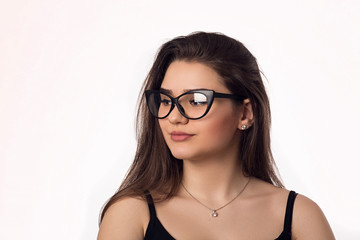 Pretty brunette student girl in glasses