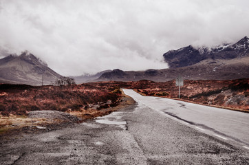 thin road in scotland, isle of skye, beautiful panorama in clouds - 159582648