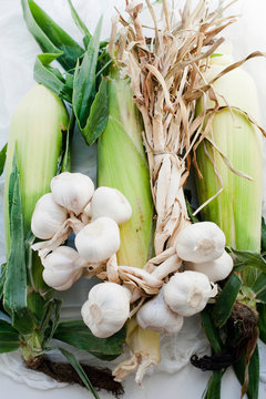 Cloves of fresh garlic with leeks