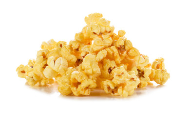 pieces of caramel popcorn on a white background