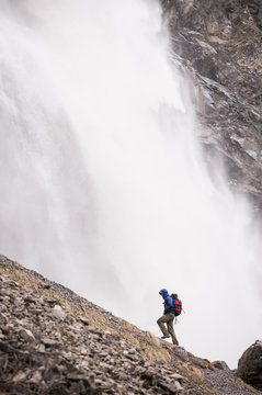 Man hiking near Engstligen falls, Adelboden, Bernese Oberland, Switzerland