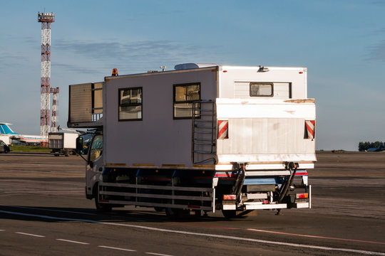 Ambulift truck for people with disabilities at the airport apron