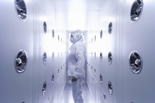 Worker wearing protective clothing in ecigarette factory