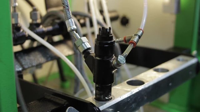 injector testing diesel on the wall