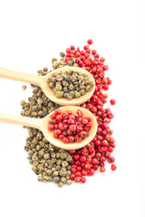 Green and Red Pepper in White Background Wood Spoon