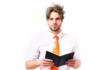 caucasian macho in acid orange tie holding notebook