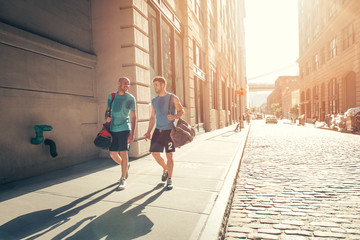Male friends returning from training