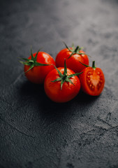 fresh tomato on black background