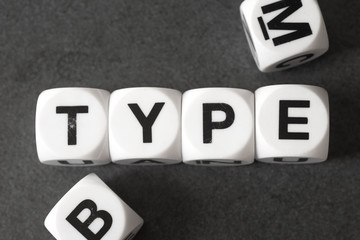 word type on toy cubes