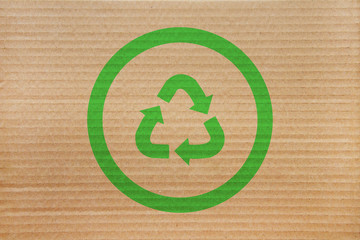 symbol for refuse reuse recycle with cardboard background 