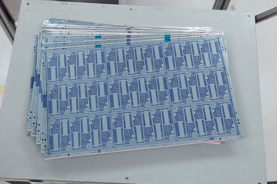 Stack of flex circuits in flexible electronics factory