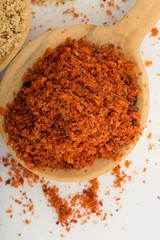 Red Spice in Wood Spoon