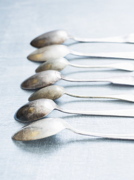 Row of spoons facedown