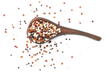 uncooked quinoa seeds isolated on white, top view