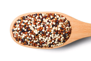 uncooked quinoa seeds isolated on white, top view