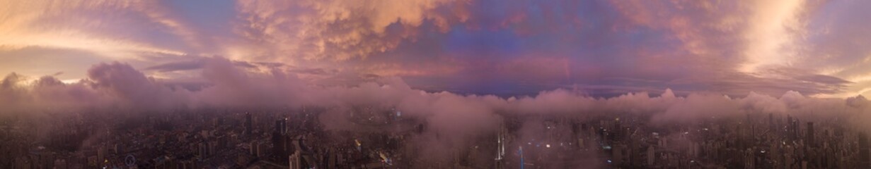 Panorama of sunset with city view by aerial photography.