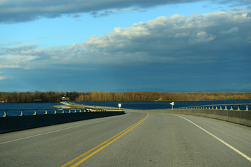 Fototapeta premium Rouses Point Bridge at the north end of Lake Champlain on the border of USA and Canada in Rouses Point, Upstate New York, USA.