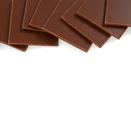 thin pieces of chocolate isolated on white