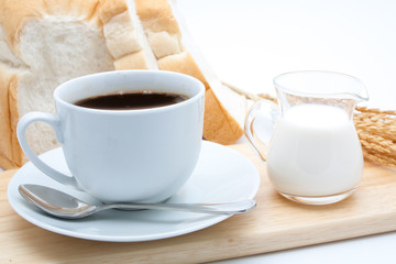 Breakfast with coffee and bread isolated