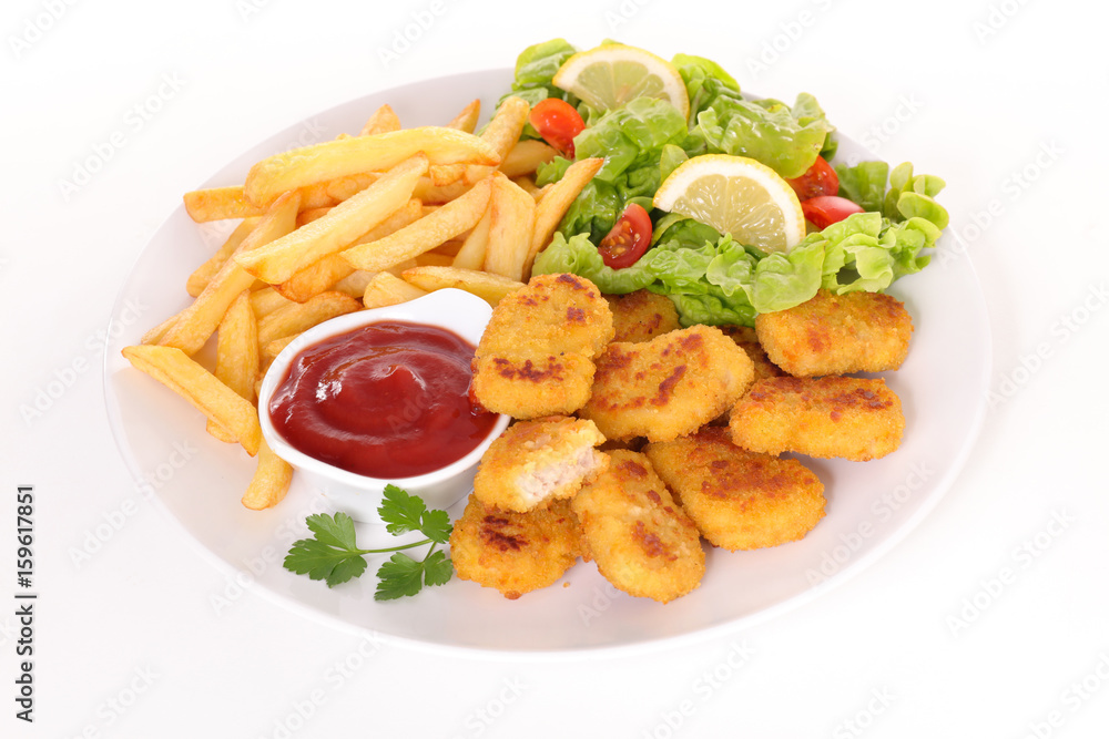 Wall mural fried chicken with french fries and salad