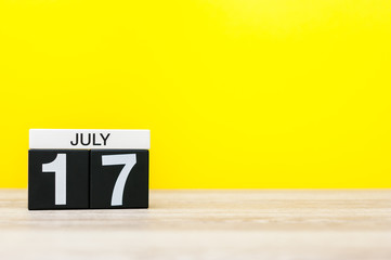 July 17th. Image of july 17, calendar on yellow background. Summer time. With empty space for text
