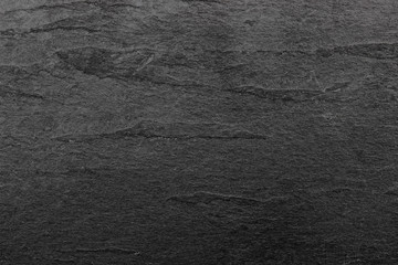 Dark grey black slate background or texture.