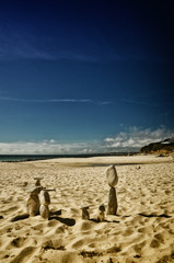 Fototapeta premium Stone tower on the beach, zen image