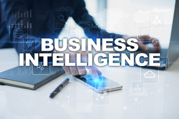 Businessman working in office, pressing button on virtual screen and selecting business...