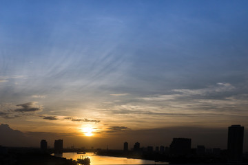 Fototapeta premium The silhouette of Bangkok city and Chaophraya river