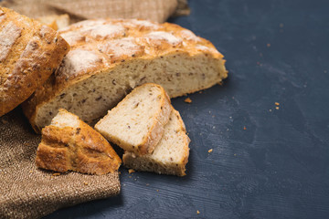 Whole wheat bread baked at home, bio ingredients, very healthy with seeds. copy space.