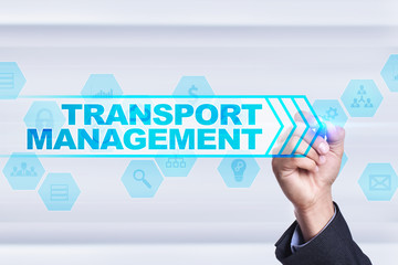 Businessman drawing on virtual screen. transport management concept.