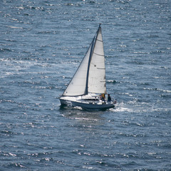 Yacht sailing on calm ocean