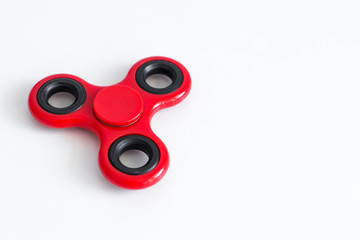 close up of fidget spinner and copy space over white table