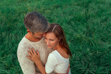 couple green meadow