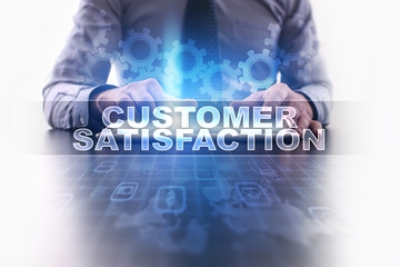 Businessman working with modern tablet pc and selecting customer satisfaction.