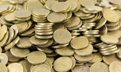 A lot of coins on a white background