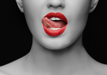 Beautiful young woman on dark background, closeup