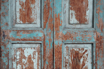 Blue color old vintage door pattern background.