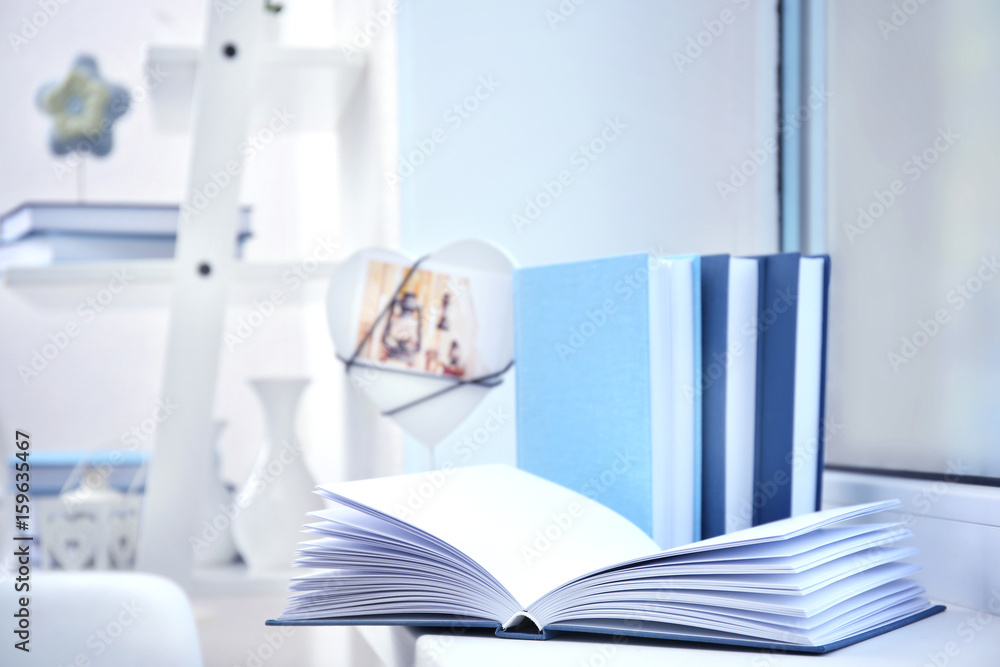 Sticker Books on windowsill in the room