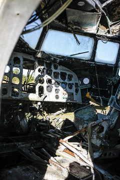 Inside a derelict cockpit of a Douglas DC-3 at an aviation junkyard in Florida