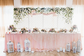 Pink wedding decoration with white and green flowers