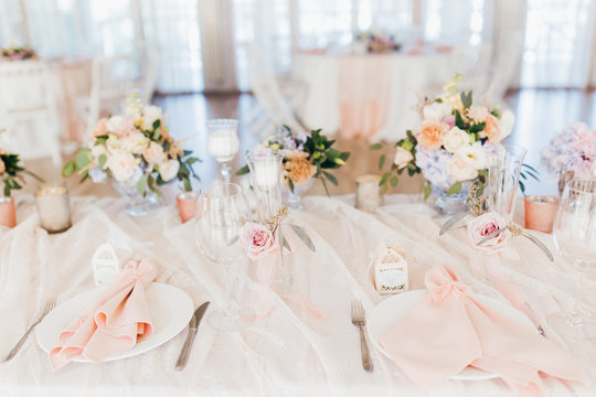 Pink wedding decoration with white and green flowers