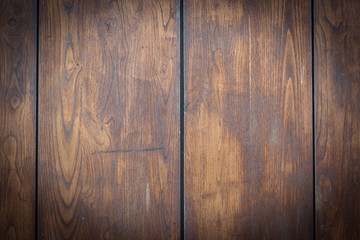 Detail of a very old wooden door with suitable vignette