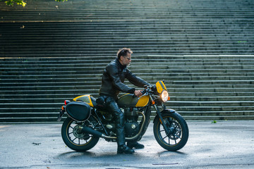 Fototapeta na wymiar Rider on his street-style motorbike 
