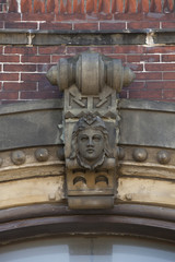 Beautiful and intricate antique door ornament. Ancient architecture.