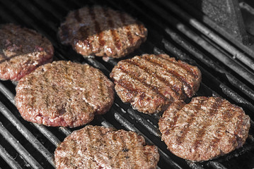 Close up burgers on grill