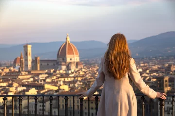 Zelfklevend Fotobehang girl looking at the Florence © Sergii Mostovyi