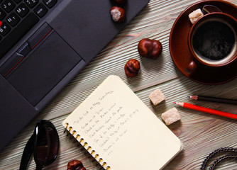 Top view of laptop and fashion accessories