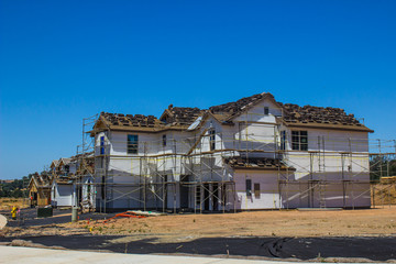 Fototapeta na wymiar New Two Story Home Under Construction